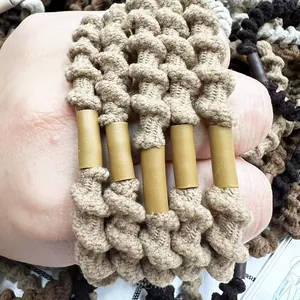 Detail of multi-colored spiral elastic hair ties worn on hand as stylish bracelets
