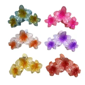 Set di sei mollette per capelli a forma di fiori di plumeria con sfumature vivaci