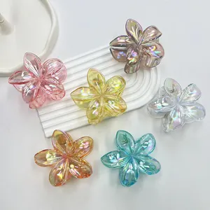 Set di mollette per capelli a forma di fiore colorato con finitura iridescente