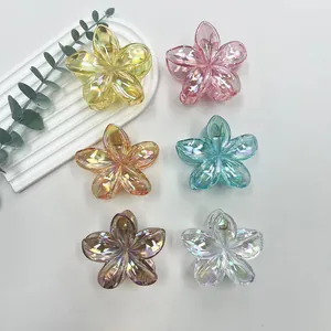 Set of six colorful iridescent plumeria flower hair clips for elegant beach styling