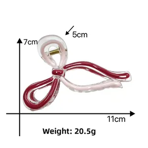 Detailed dimensions of the 11cm pink and red bow hair claw clip with size measurements
