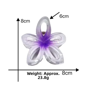 Detail view of purple gradient plumeria hair claw clip with size and weight measurements