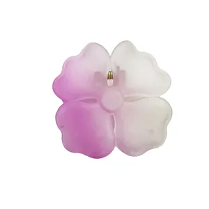 Floral claw clip with pink and purple gradient matte finish and golden metal spring
