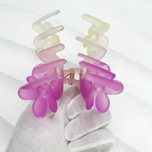 Detail of 11cm gradient flower hair claw clip with matte finish and metal spring