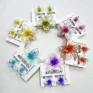 Set di fermagli per capelli a forma di plumeria glitterata in sei colori vivaci