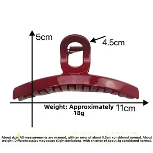 Dimensiones detalladas de una pinza de pelo rojo oscuro de 11 cm con acabado brillante