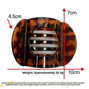 Detailed view of leopard print hair clip with precise dimensions 10cm x 7cm x 4.5cm