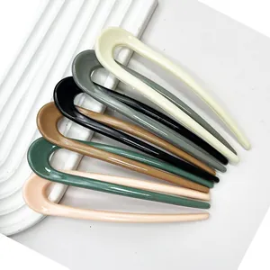 Set of six minimalist U-shaped hair pins in diverse colors for elegant hairstyling