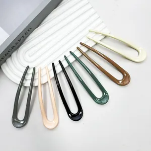 Elegant U-shaped hair pins in multiple colors for daily styling and secure buns