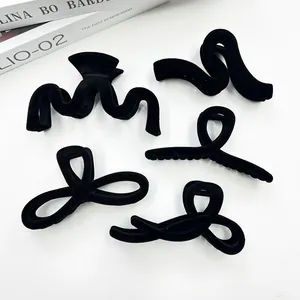 5-piece set of elegant black flocked hair claws for women in various retro bow shapes