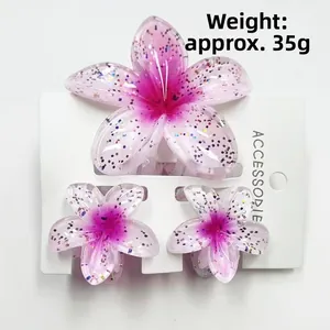 Three-piece plumeria hair clip set in gradient pink with glitter, weighing approx. 35g
