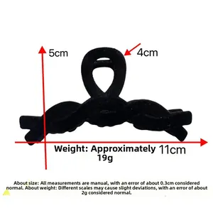 Detail view of large 11cm black flocked velvet shark hair claw clip with dimensions