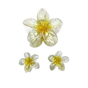 Plumeria flower hair clip set with large shark clip and matching small resin hair accessories