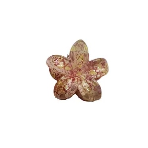 Pinza per capelli a fiore di frangipane con motivi colorati rosa e gialli in acetato