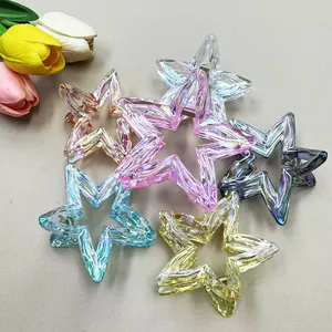 Colorful iridescent star-shaped hair claws in a six-piece set with a glossy gradient finish
