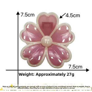 Dimensions détaillées de la pince à cheveux fleur rose avec spécifications de taille et poids