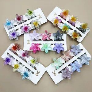 Set mit 4cm bunten Plumeria-Blumen-Haarklammern aus Harz und Marmor auf einer Displaykarte