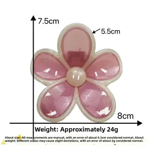 Detail showing dimensions of the translucent pink plumeria flower hair claw clip
