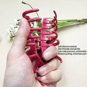 Soft magenta silicone hair claw clip for women featuring a flexible multi-tooth design
