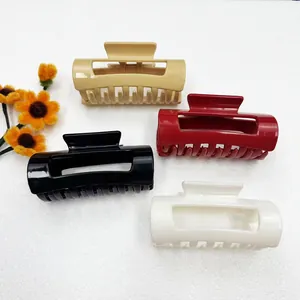 Set of four large matte hair claws in khaki, burgundy, black, and beige colors