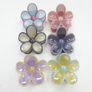 Set of six jelly frangipani hair claw clips in various colors for vacation styling