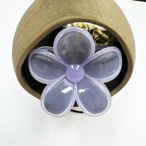 Detail of lavender jelly frangipani hair claw clip with glossy resin finish