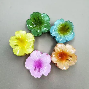 Set di cinque mollette per capelli a forma di fiore in resina blu rosa e verde
