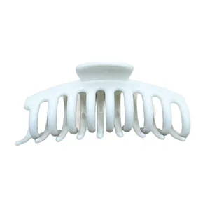 Minimalist white soft silicone shark claw clip for hair with a smooth glossy finish