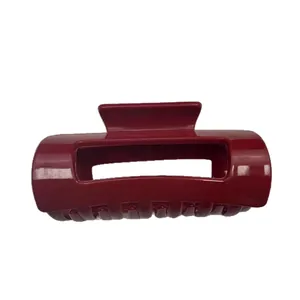 Glossy burgundy rectangular hair claw clip in soft silicone for thick hair styling