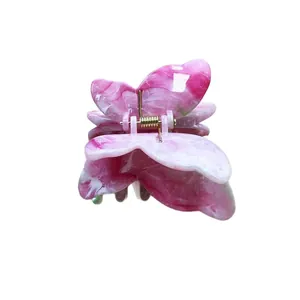 Elegant double-layered pink marble butterfly hair claw clip with golden metal spring