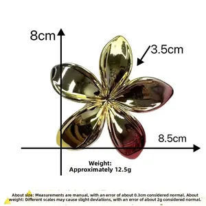Detailed size specifications for the gold metal frangipani flower hair clip accessory
