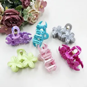 Lot de six pinces à cheveux fleurs colorées avec texture marbrée et ressort doré