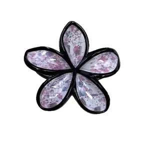 Fashionable plumeria hair claw clip with pink ink texture and black frame for women
