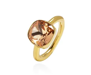 Macro view of square champagne gemstone ring with a polished gold band and faceted cut