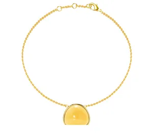 Close-up of golden stainless steel chain featuring a yellow tiger eye agate pendant
