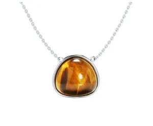 Macro detail of triangle Tiger's Eye gemstone pendant with s925 silver setting