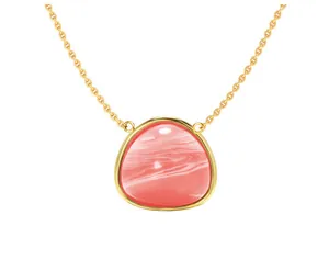 Detailed close-up of gold triangle pendant with a pink rhodochrosite gemstone inlay