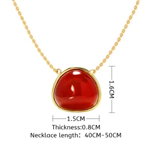 Trillion cut red gemstone pendant necklace in gold finish with dimensions shown