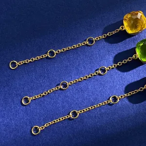 Japanese style gold chain bracelet with square emerald and yellow crystal gemstones