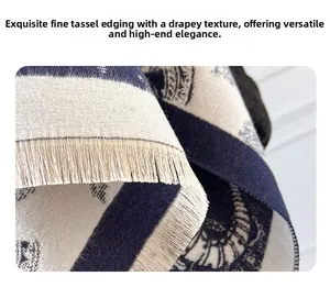 Detailed close-up of fine twisted tassels and thick jacquard weave cashmere feel scarf