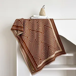 Caramel and beige geometric pattern cashmere-feel scarf with tassels for winter fashion
