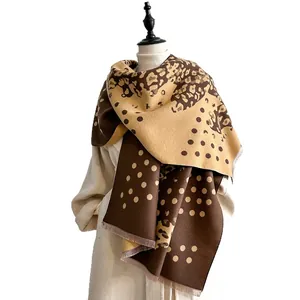 Thick leopard and polka dot print winter shawl for women with soft tassel fringe detail