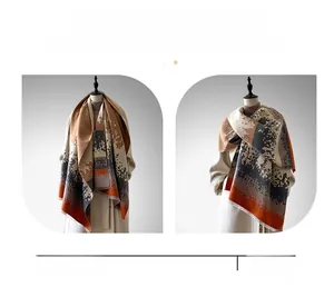 Abstract pattern scarf showing versatile draping styles and warm cashmere-like fabric detail