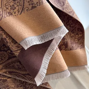 Winter paisley cashmere shawl with vintage patterns and delicate fringe details