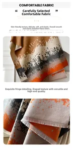 Detail of soft imitation cashmere scarf with fine-twisted fringes and warm gradient pattern