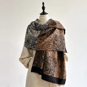 Winter paisley cashmere-like shawl with ethnic patterns and fringe in brown and black