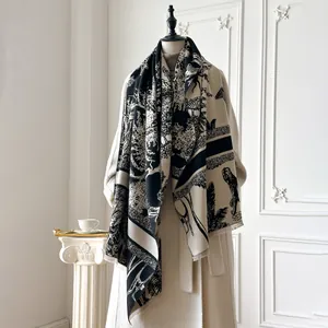 Detail of Toile de Jouy forest print shawl with fine fringed edges on a mannequin