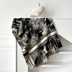 Detailed texture of cashmere-feel scarf featuring artistic animal forest print with fringe