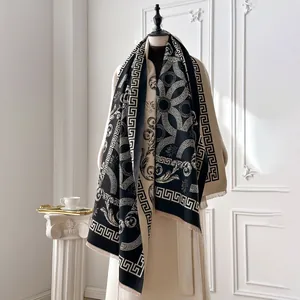 Detail of baroque pattern and Greek key border on a soft cashmere-feel winter shawl