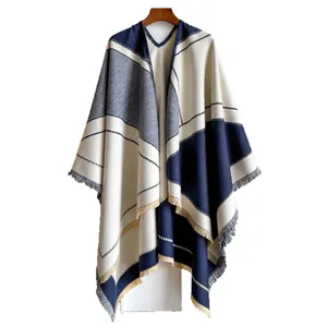 Winter oversized geometric patchwork knit poncho shawl with fringe hem for women